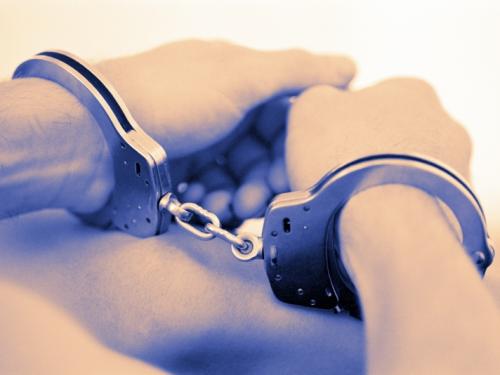 hands in handcuffs Mercer County Criminal Defense Lawyer